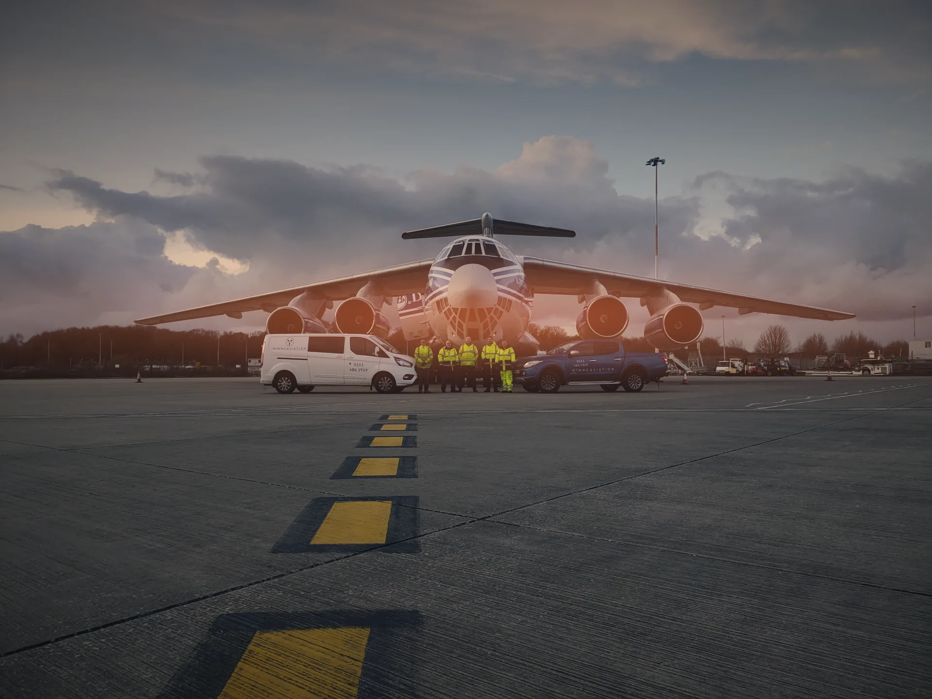 Wynne Aviation team with an IL-76 freighter on the ramp at Liverpool